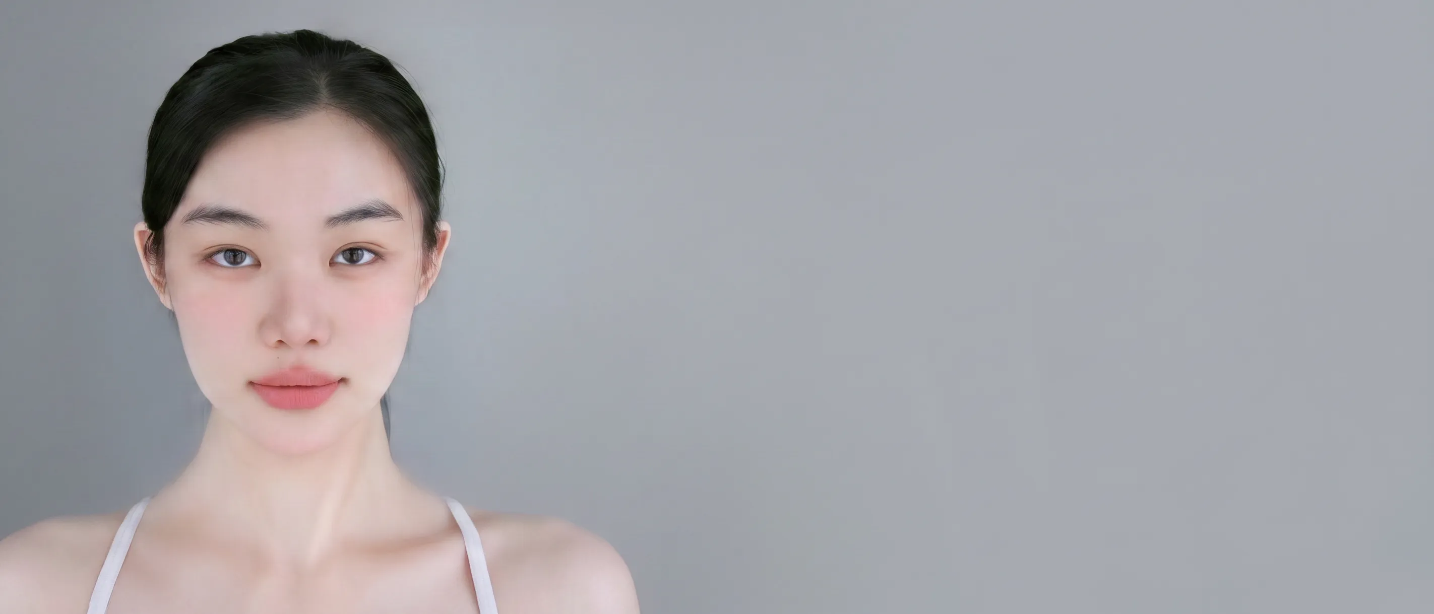 Model wearing The Essential Natural Lipstick